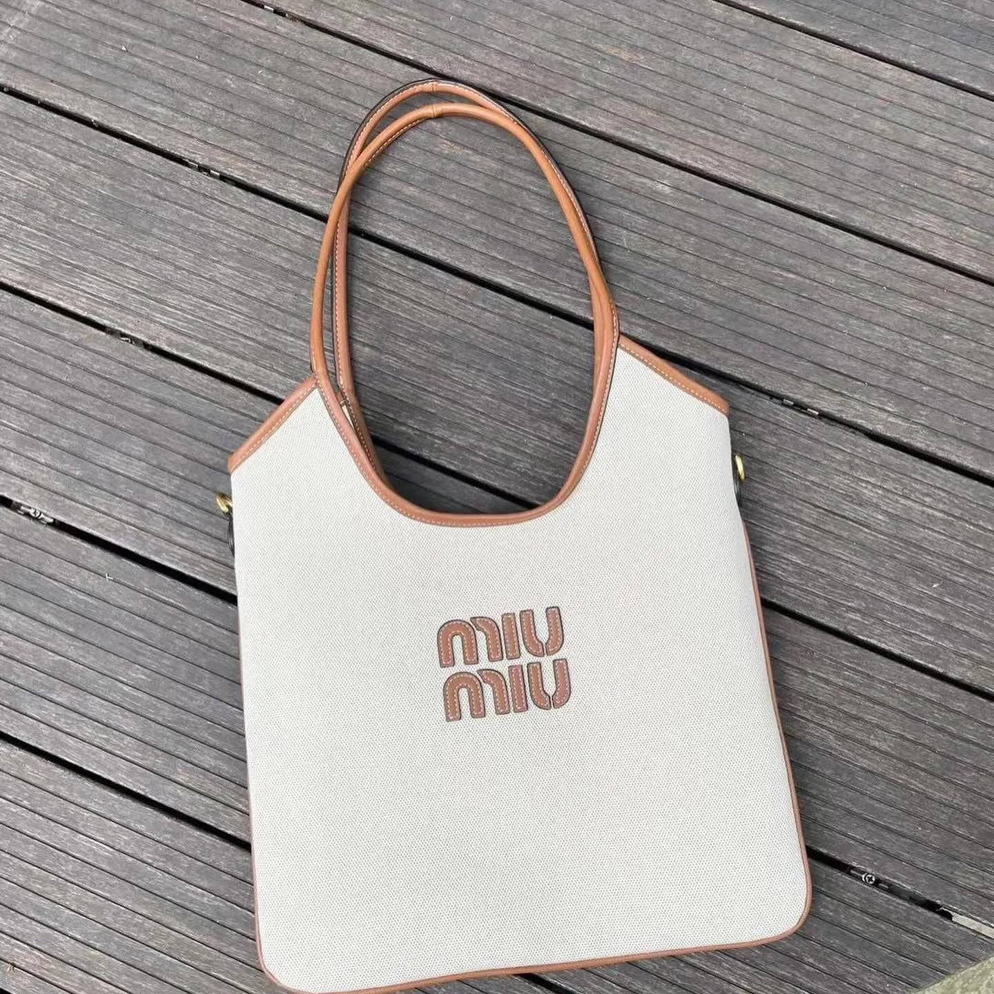 Miu Miu woven canvas tote photo 1