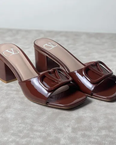 Valentino VLogo Slide
