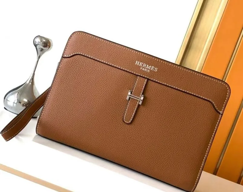 Hermès flat clutch / pochette with T-bar clasp photo 1